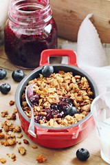 Blueberry granola crisp. Clean-eating gluten free dessert . Superfoods concept.Toned image, selective focus