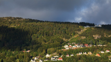 Fototapeta na wymiar Mount Floyen. A view of Mount Floyen above the city of Bergen in Norway. The funicular railway can be seen climbing Mount Floyen.