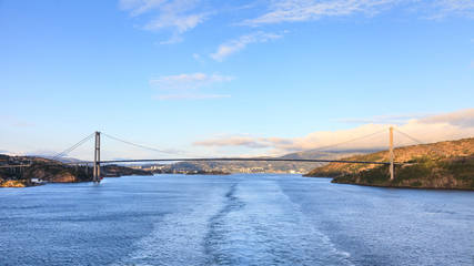 Sotra Bridge.  Sotra bridge is a suspension bridge crossing Knarreviksundet in Norway connecting Fjell and Bergen.  The city of Bergen can be seen in the background.