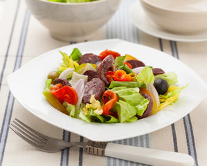 Mixed salad with black pudding sausage