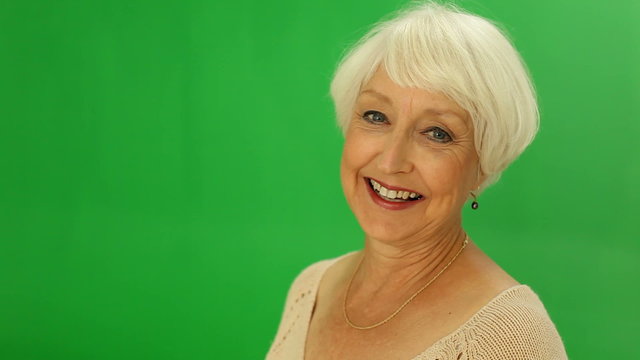 Green screen portrait of senior woman