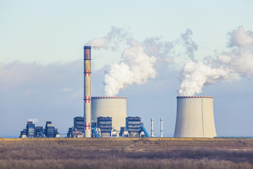 Fototapeta na wymiar thermal power plant chimneys- industrial landscape