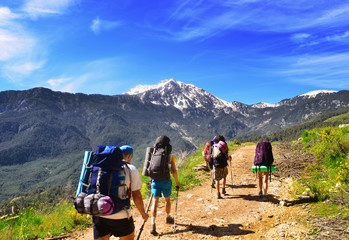 Fototapeta premium Group of hikers in the mountains, view of Tahtali mountain 