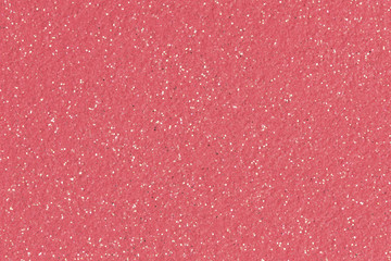 Christmas pink background with glitter.  Low contrast photo.