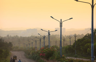 Road in rural India under evening sun light
