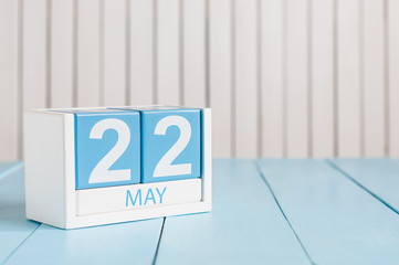 May 22nd. Image of may 22 wooden color calendar on white background.  Spring day, empty space for text