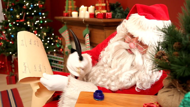 Santa Claus writing on list