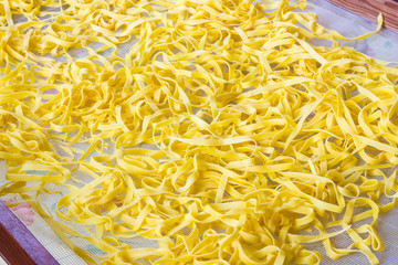 Drying real tagliatelle Emiliane