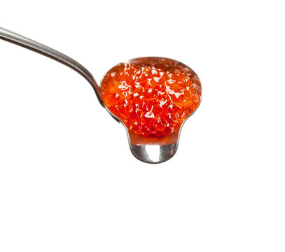 big spoon with caviar on the white background