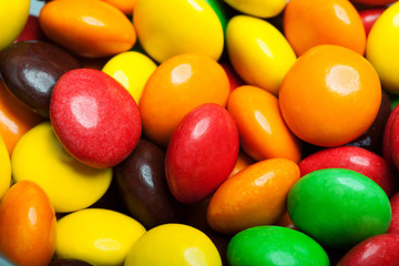 Close up of a pile of colorful chocolate coated candy