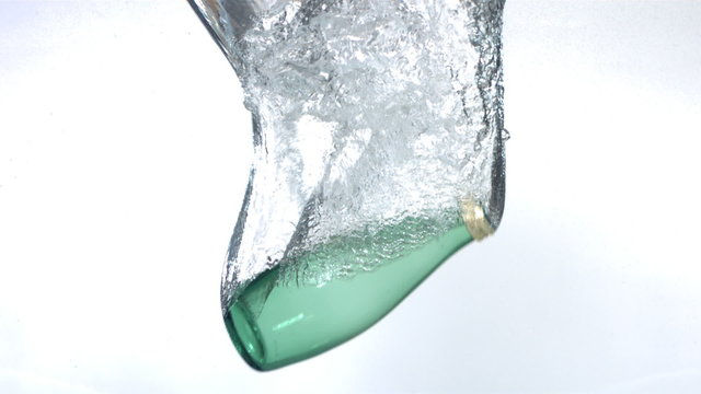 Water bottle splashing, slow motion