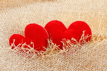 Texture of sackcloth close up and heart shape from felt.