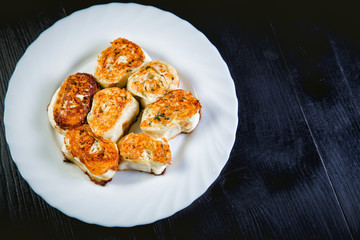 fried rolls of pita and chicken breast