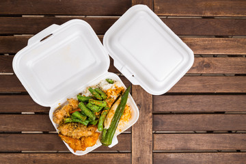 Convenient but unhealthy polystyrene lunch boxes with take away meal