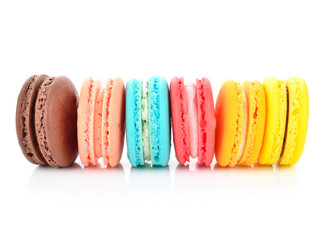 colorful macarons on white background