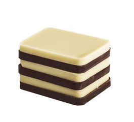 White and Brown, Dark chocolate bar in a row layers isolated on white background