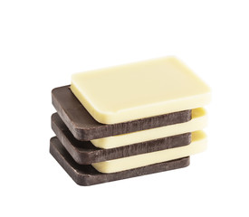 White and Brown, Dark chocolate bar in a row layers isolated on white background