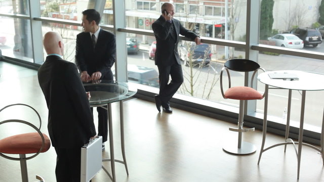 Businesspeople in office lobby