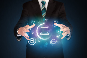 holding digital media icons