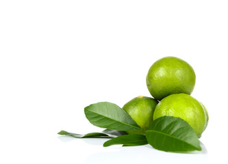 Lime with leaf on a white background.