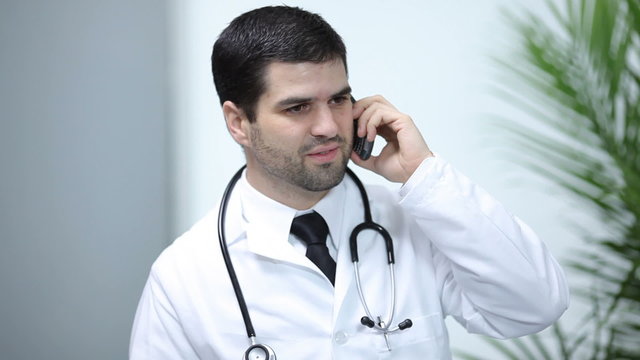 Doctor talking on cell phone