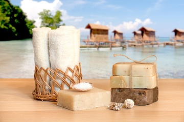 Fototapeta na wymiar SPA set with pieces of soap and towels.