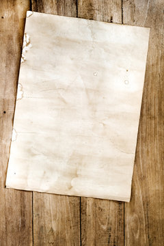 Empty old paper on wood texture - vintage background