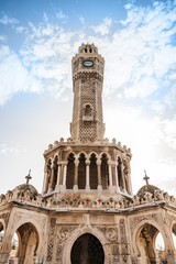 Fototapeta na wymiar Historical clock tower under cloudy sky, Izmir