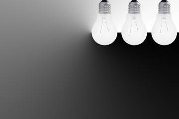 three light bulbs hang on ceiling right side,gradient black