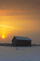 Two Barns In The Winter Sunrise