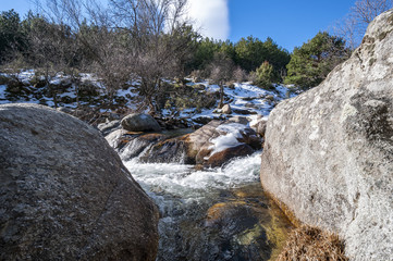 The River Manzanares along its course through La Pedriza, in Guadarrama Mountains National Park, Madrid, Spain