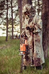 Smoking maniac with the chainsaw