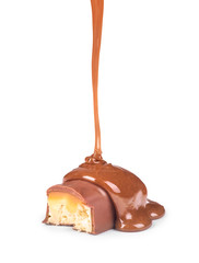 sweet caramel sauce is poured on a chocolate bar