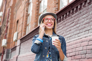 Young woman walking down the street