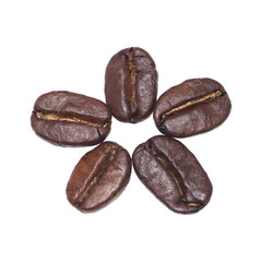 Obraz premium Five coffee beans isolated on white