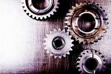 Gears on a metal background