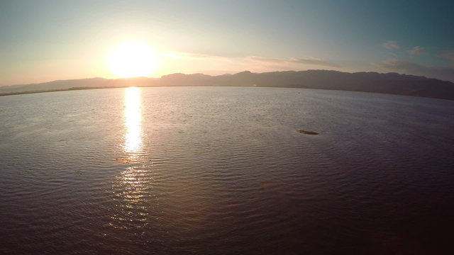 Flying over Inle Lake at sunset, Myanmar (Burma), 4k
