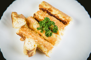 Rolls of cheese and bread, a dish in cafe