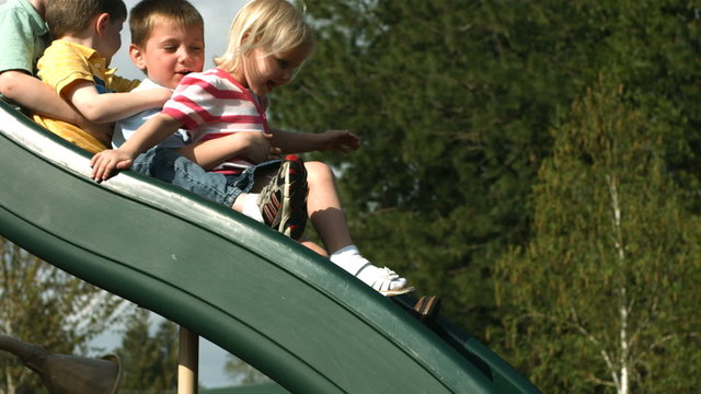 Children on slide, slow motion