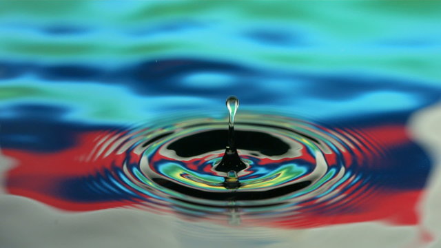 Colorful water drip, slow motion
