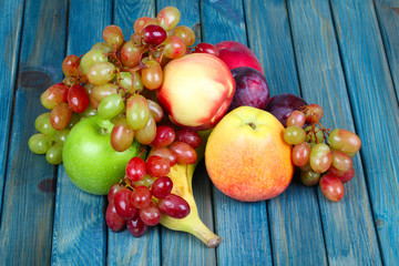Naklejka na ściany i meble fruits on wooden table