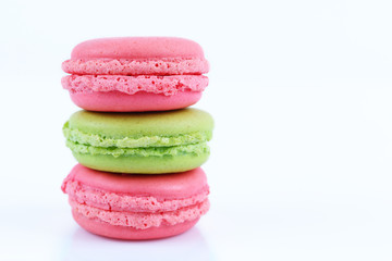 Three macaroons isolated on white