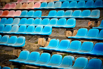 Fototapeta premium old stadium chairs