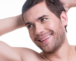 Obraz premium Portrait of happy smiling young man.