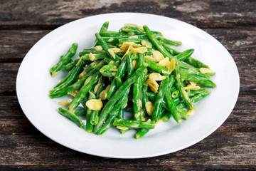 Green beans roasts garlic and flaked almond