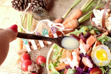 Fresh salad and egg with dressing delicious.