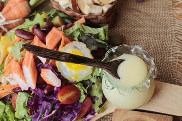 Fresh salad and egg with dressing delicious.
