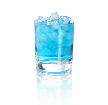glass with blue water and ice