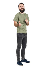 Spontaneously laughing bearded man in green t-shirt pointing fingers at camera. Full body length...
