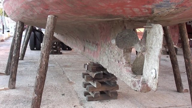 A boat on chocks at dry dock